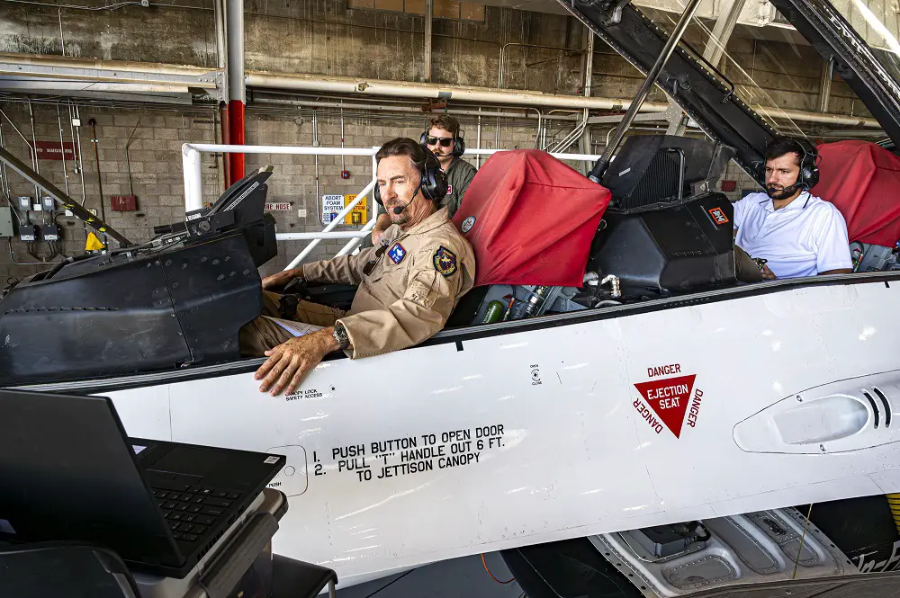 William Gray, Chief Test Pilot, Air Force Test Pilot School, and other engineers conduct software updates to the X-62 Variable Stability In-Flight Simulator Test Aircraft at Edwards Air Force Base, California, Aug. 3, 2022. (Air Force photo by Giancarlo Casem)