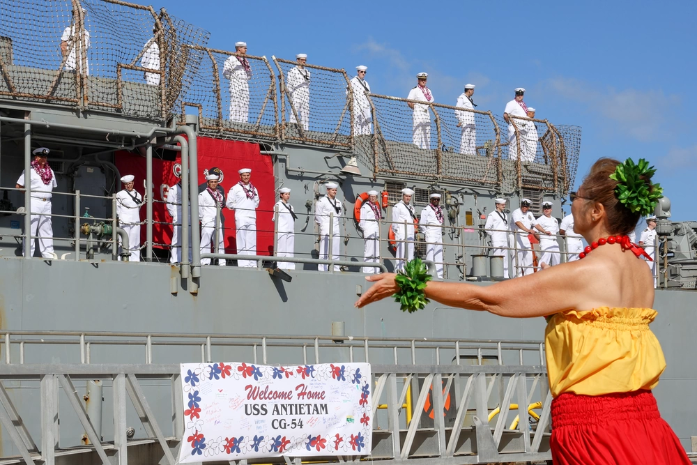 U.S. Navy Sailors aboard the Ticonderoga-class guided missile-cruiser USS Antietam (CG 54) arrive to their new homeport at Joint Base Pearl Harbor-Hickam, Hawaii, April 5, 2024.