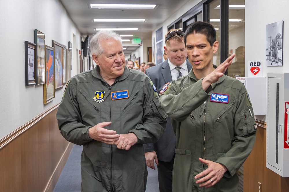 Col. James Valpiani, Air Force Test Pilot School commandant, provides final points of instruction to Secretary of the Air Force Frank Kendall during his visit to Edwards Air Force, California, May 2. Kendallk experienced the future of flight as he flew aboard the X-62 VISTA.