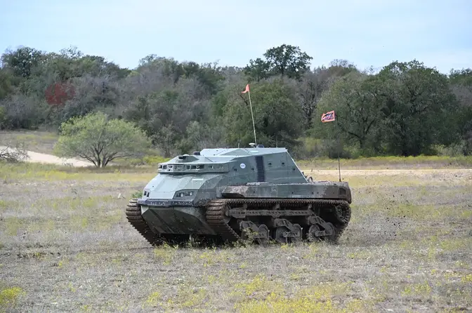 Unoccupied RACER Fleet Vehicle (RFV) autonomously negotiating a RACER experiment course at E4 in Texas.