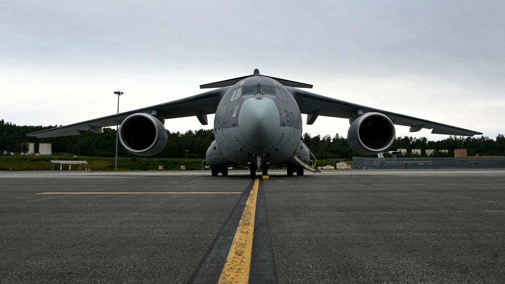 US Marines and Japan Air Self-Defense Force Conduct Joint Loading Test of HIMARS and JLTV on Kawasaki C-2