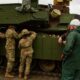 US Army Deploys M1A2 Sep V2 Tanks Fitted with Trophy APS and Reactive Armor Tiles to Germany