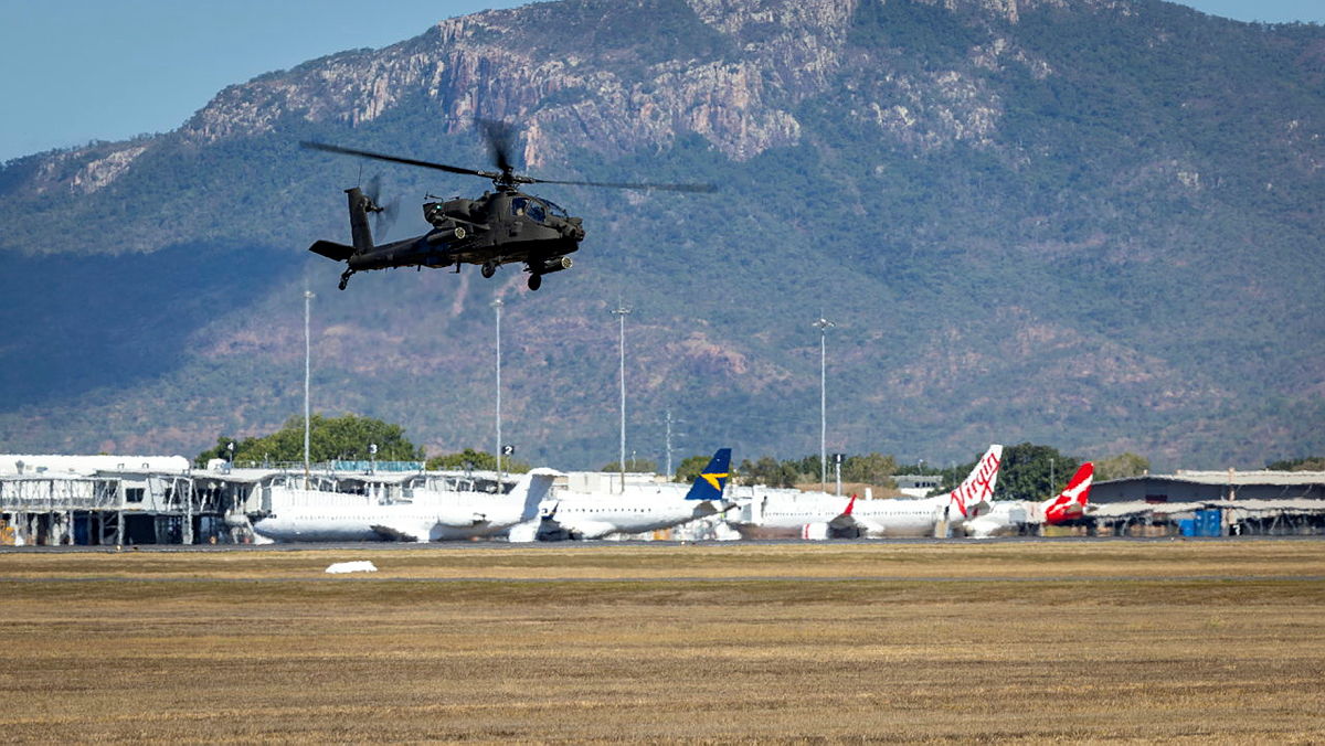An Australian AH-64E Apache from the 1st Aviation Regiment lands at RAAF Base Townsville during Exercise Possum Guns.
