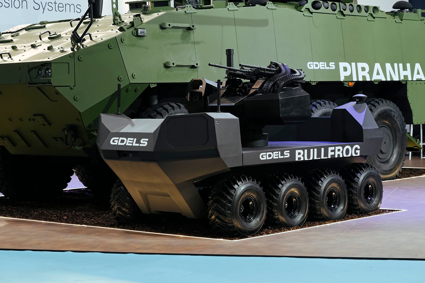 BULLFROG 8x8 Wheeled Unmanned Ground Vehicles (UGV) with detached small-caliber effectors.