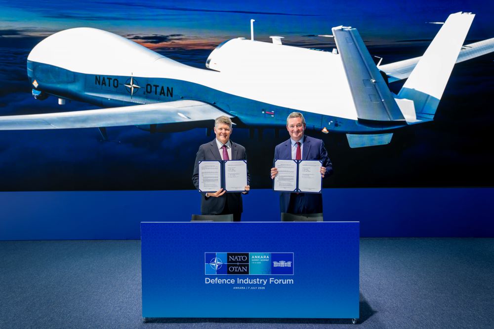Northrop Grumman’s Triton MQ-4C with NATO livery, Frank Morley, President, International, Northrop Grumman and Ben Bridge, Chairman Airbus Defence and Space in the UK. (Photo by Northrop Grumman)