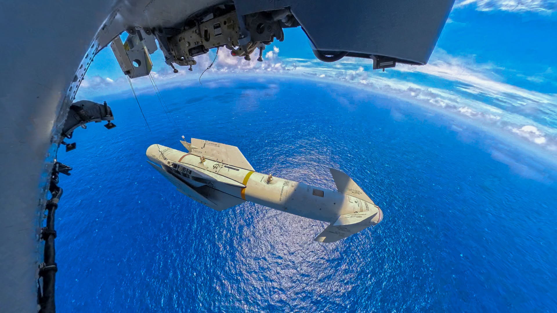 An AGM-119 Penguin anti-ship guided missile falls away after launch from a No. 6 Squadron SH-2G(I) Super Seasprite during the live-fire SINKEX at Exercise RIMPAC.