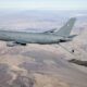 A Boeing KC-46A Pegasus aerial refueling aircraft connects with an F-35A Lightning II over California