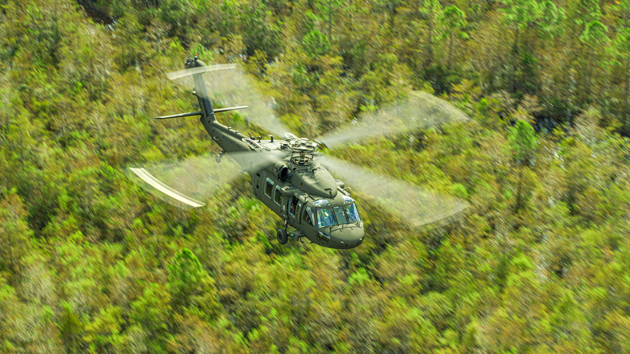 The Sikorsky UH-60 Black Hawk is a four-blade, twin-engine, medium-lift military utility helicopter manufactured by Lockheed Martin.