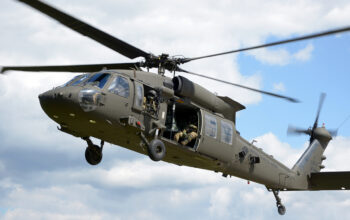 The Sikorsky UH-60 Black Hawk is a four-blade, twin-engine, medium-lift military utility helicopter manufactured by Lockheed Martin.