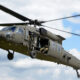 The Sikorsky UH-60 Black Hawk is a four-blade, twin-engine, medium-lift military utility helicopter manufactured by Lockheed Martin.