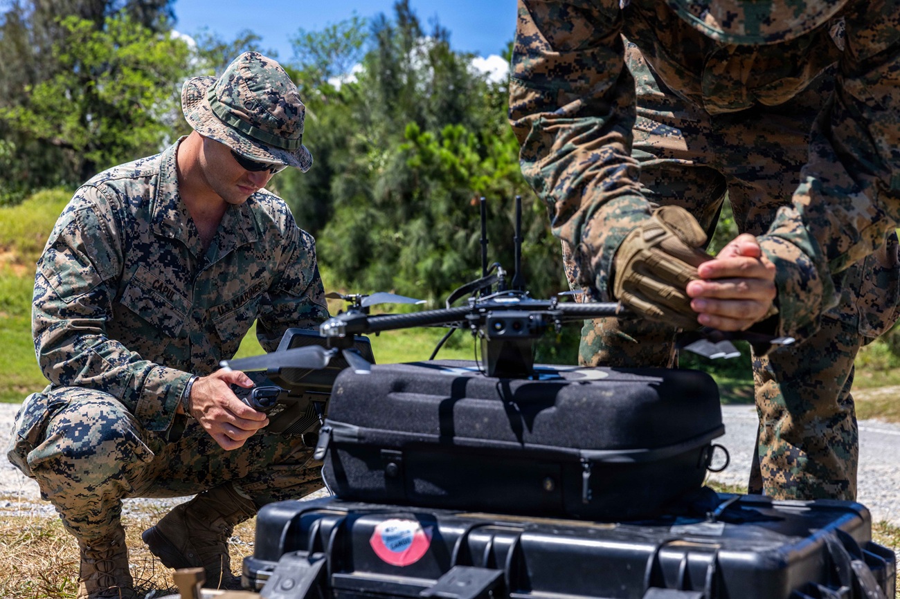 Marine Corps 1st Lt. Andrew Capul, left, a forward observer, and Cpl. Jacob Milstead, an intelligence specialist assigned to the 3rd Battalion, 7th Marine Regiment, forward deployed under the 4th Marine Regiment, 3rd Marine Division, as part of the unit deployment program, operate a Skydio X2D during a live-fire smart shooter range at Camp Hansen, Okinawa, Japan, July 31, 2026.